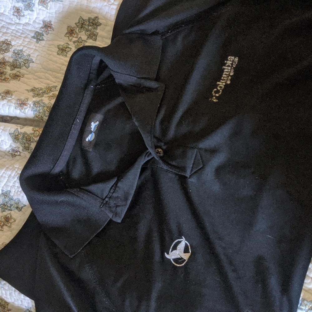 Pacific Whale Foundation men's black collared polo shirt!